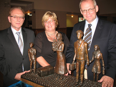 Delhi Belgian Club held a banquet June 24, for Belgian dignitaries Paul De Vos, left, Belgium's consul in Toronto and Bruno van der Pluijm, right, Belgium's ambassador to Canada in Ottawa. Joining them is Nancy Pynaert, club president.