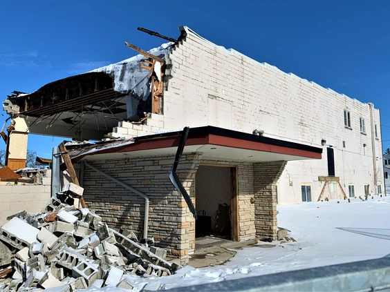 The former Delhi Belgian Hall on James Street is coming down brick by brick, with the demolition beginning at the rear of the sprawling, 30,000-square-foot property. This view from William Street shows the entrance to the former downstairs lounge known as the Shield and Friends Bar and Games Room. – Monte Sonnenberg